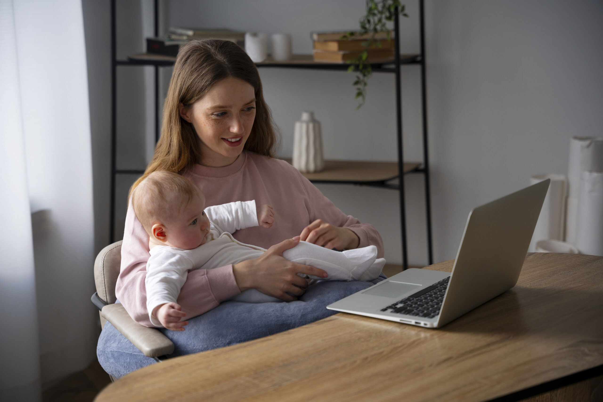 medium-shot-mother-with-cute-newborn